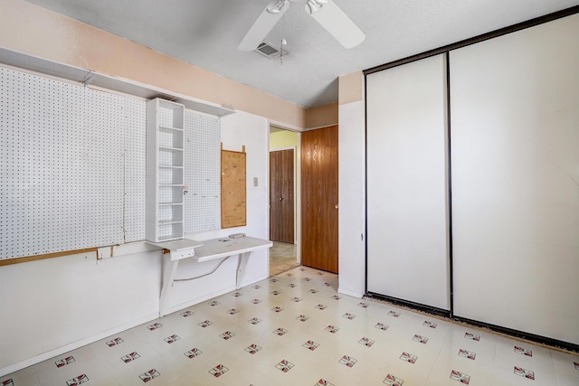 6054 Jack Rabbit Rd NE, Rio Rancho, NM 87144 - bathroom with tile patterned floors and a ceiling fan