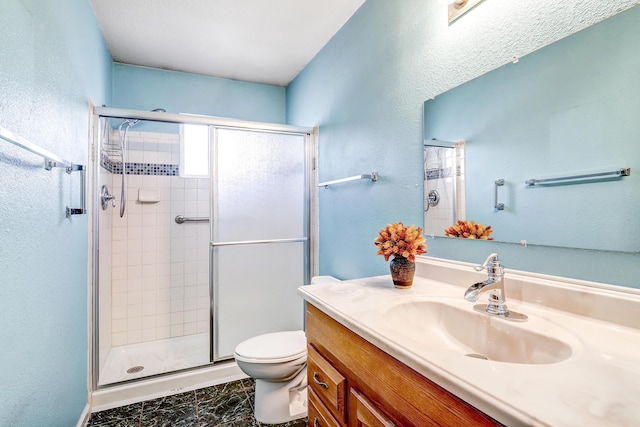 6054 Jack Rabbit Rd NE, Rio Rancho, NM 87144 - full bath featuring a stall shower, vanity, and a textured wall
