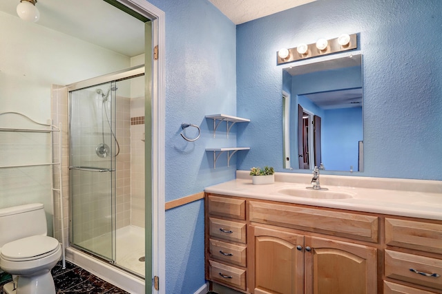 6054 Jack Rabbit Rd NE, Rio Rancho, NM 87144 - full bath featuring a stall shower, vanity, a textured wall, and marble look tile flooring