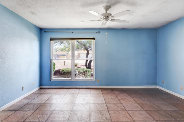 6054 Jack Rabbit Rd NE, Rio Rancho, NM 87144 - empty room with a textured ceiling and a ceiling fan