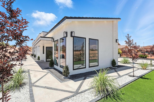5624 Laredo, Rio Rancho, NM 87144 - rear view of house featuring stucco siding