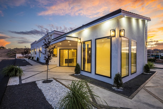 5624 Laredo, Rio Rancho, NM 87144 - back of property featuring stucco siding and a patio area