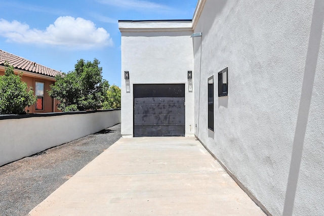 5624 Laredo, Rio Rancho, NM 87144 - doorway to property with driveway, stucco siding, and a garage