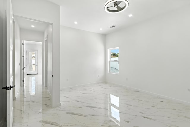 5624 Laredo, Rio Rancho, NM 87144 - unfurnished room featuring recessed lighting and light marble finish floors
