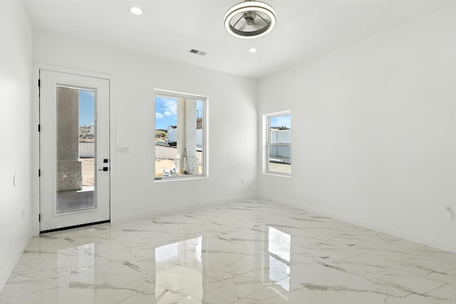 5624 Laredo, Rio Rancho, NM 87144 - empty room with recessed lighting and light marble finish flooring
