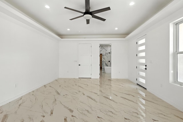 5624 Laredo, Rio Rancho, NM 87144 - unfurnished bedroom featuring recessed lighting, a raised ceiling, light marble finish flooring, and a ceiling fan