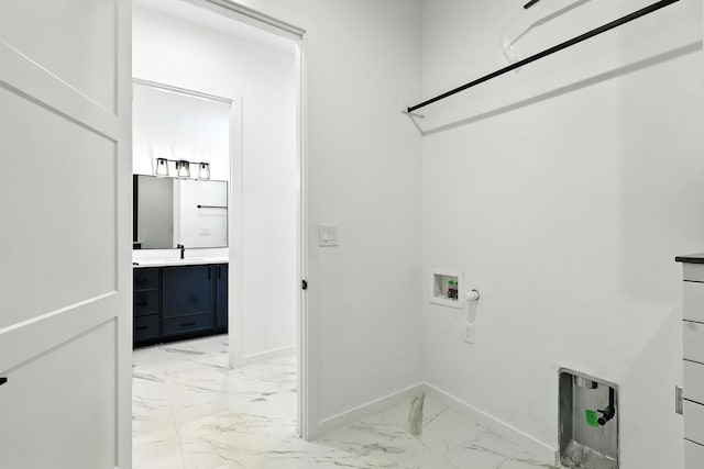 5624 Laredo, Rio Rancho, NM 87144 - laundry area featuring light marble finish flooring, hookup for a washing machine, and gas dryer hookup