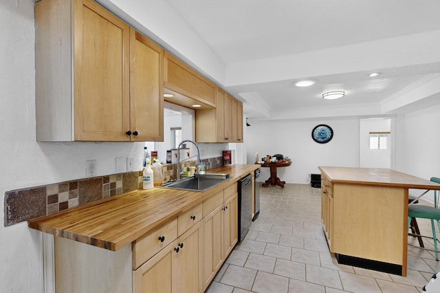 855 Foxcroft Loop, Bosque Farms, NM 87068 - kitchen featuring wooden counters, a breakfast bar, a kitchen island, a tray ceiling, and black dishwasher