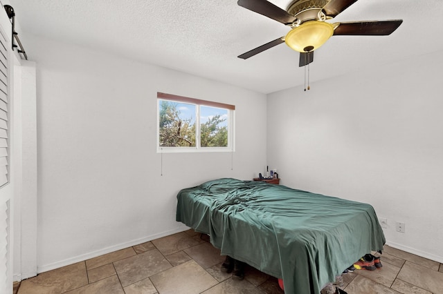 855 Foxcroft Loop, Bosque Farms, NM 87068 - bedroom with baseboards and ceiling fan