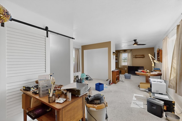 855 Foxcroft Loop, Bosque Farms, NM 87068 - office space with ceiling fan, a barn door, and carpet