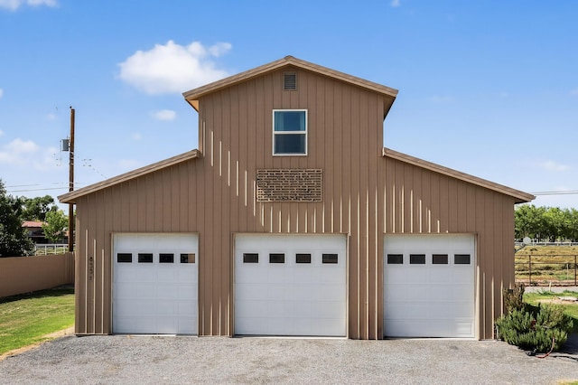 855 Foxcroft Loop, Bosque Farms, NM 87068 - view of front of property featuring a detached garage and board and batten siding