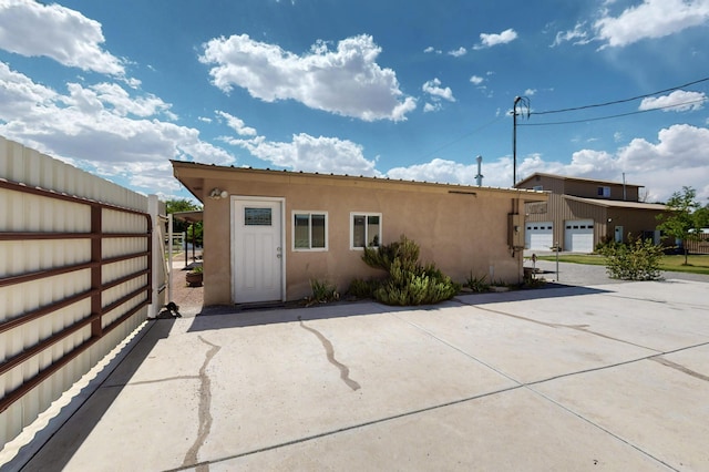 855 Foxcroft Loop, Bosque Farms, NM 87068 - back of house featuring stucco siding