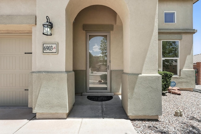 6903 Wrangell Loop NE, Rio Rancho, NM 87144 - view of exterior entry featuring stucco siding