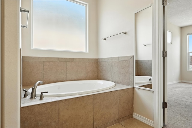 6903 Wrangell Loop NE, Rio Rancho, NM 87144 - full bathroom with a bath and a textured ceiling