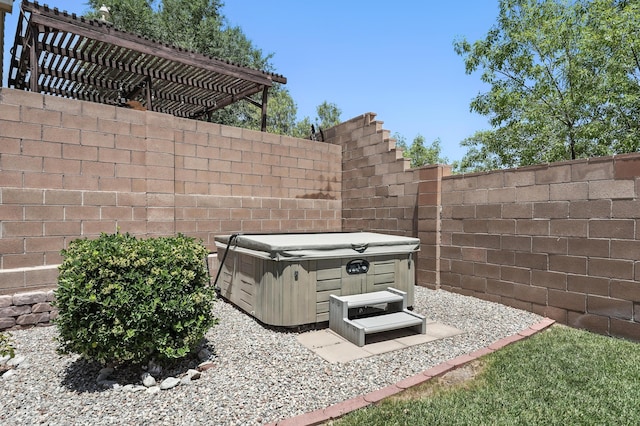 6903 Wrangell Loop NE, Rio Rancho, NM 87144 - view of patio / terrace featuring a hot tub and a pergola