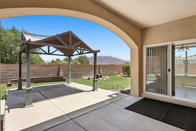 6903 Wrangell Loop NE, Rio Rancho, NM 87144 - view of patio / terrace featuring a mountain view