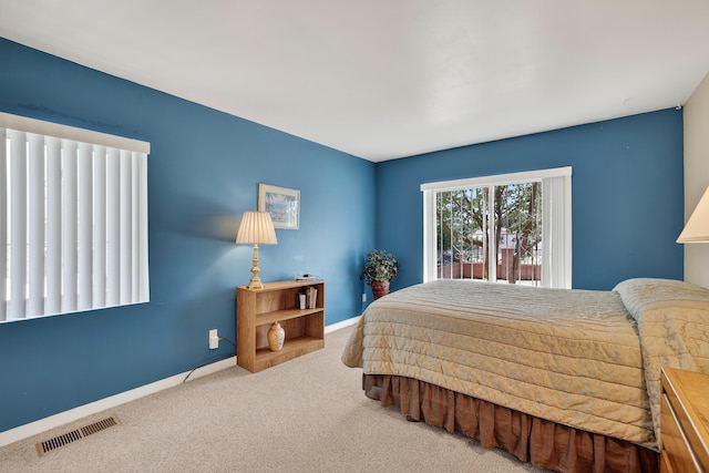 302 Crestview Dr SW, Albuquerque, NM 87105 - carpeted bedroom featuring baseboards