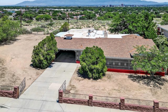 302 Crestview Dr SW, Albuquerque, NM 87105 - aerial view of property and surrounding area with a mountainous background