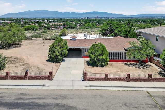 302 Crestview Dr SW, Albuquerque, NM 87105 - view of subject property featuring a mountain backdrop