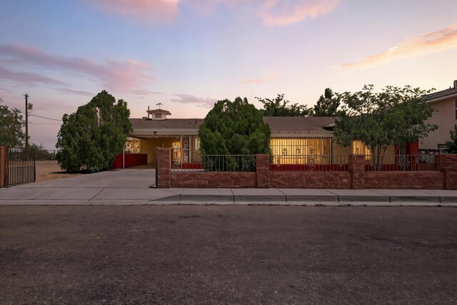 302 Crestview Dr SW, Albuquerque, NM 87105 - view of front of property featuring a fenced front yard and driveway