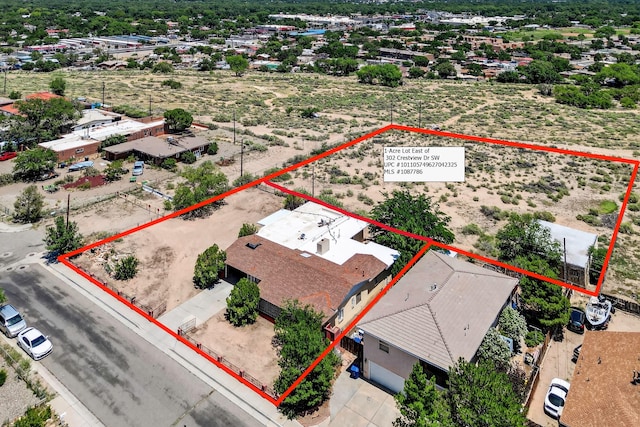 302 Crestview Dr SW, Albuquerque, NM 87105 - aerial overview of property's location with property parcel outlined