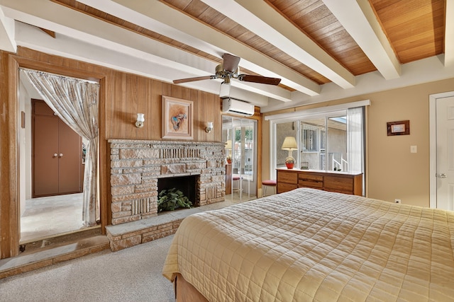 302 Crestview Dr SW, Albuquerque, NM 87105 - bedroom featuring a wall mounted air conditioner, carpet flooring, a fireplace, and a wooden ceiling with exposed beams