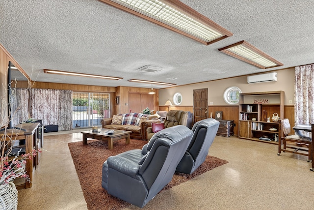 302 Crestview Dr SW, Albuquerque, NM 87105 - living room with a textured ceiling, an AC wall unit, wainscoting, and wood walls