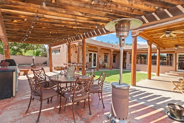 704 Tyler Rd NW, Los Ranchos, NM 87107 - view of patio featuring ceiling fan and outdoor dining area