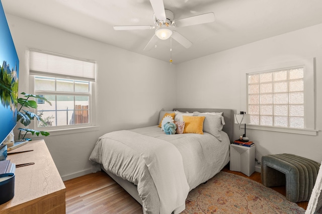 704 Tyler Rd NW, Los Ranchos, NM 87107 - bedroom with wood finished floors and ceiling fan