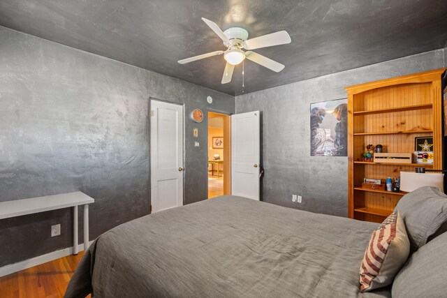 704 Tyler Rd NW, Los Ranchos, NM 87107 - bedroom with wood finished floors and ceiling fan