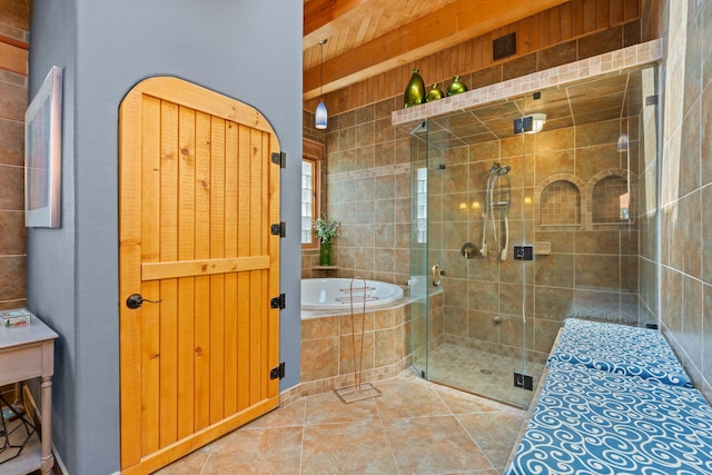 704 Tyler Rd NW, Los Ranchos, NM 87107 - bathroom featuring a bath, a stall shower, and tile patterned flooring