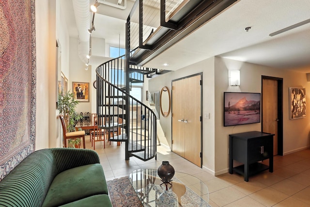524 Central Ave SW # 803, Albuquerque, NM 87102 - stairs with tile patterned floors and a high ceiling