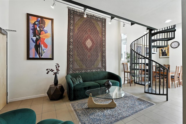 524 Central Ave SW # 803, Albuquerque, NM 87102 - living area with tile patterned flooring, stairs, and track lighting