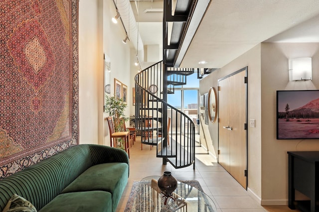524 Central Ave SW # 803, Albuquerque, NM 87102 - staircase featuring tile patterned flooring and baseboards