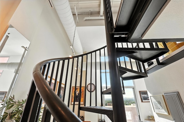 524 Central Ave SW # 803, Albuquerque, NM 87102 - staircase with a towering ceiling