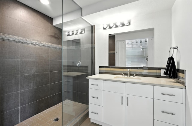 524 Central Ave SW # 803, Albuquerque, NM 87102 - bathroom featuring vanity and tiled shower