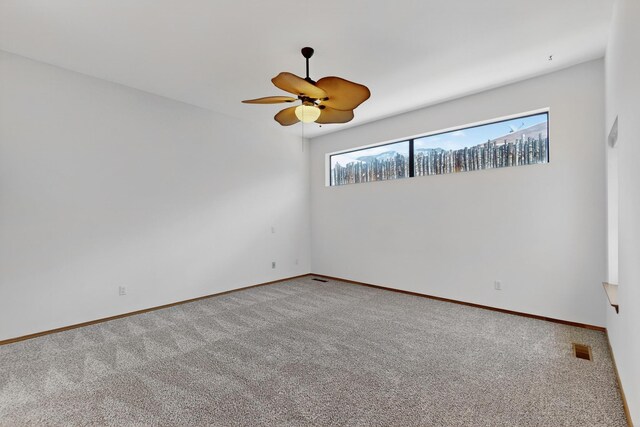 1865 Tramway Terrace Loop NE, Albuquerque, NM 87122 - unfurnished room with carpet flooring and ceiling fan