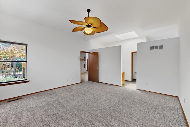 1865 Tramway Terrace Loop NE, Albuquerque, NM 87122 - carpeted empty room featuring a skylight and ceiling fan