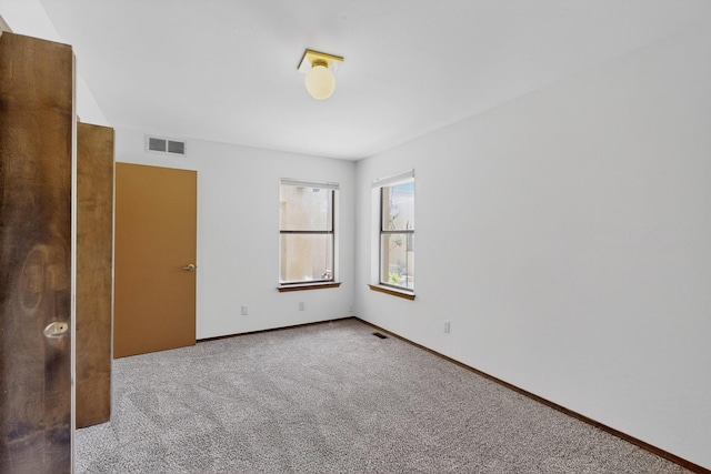 1865 Tramway Terrace Loop NE, Albuquerque, NM 87122 - empty room featuring carpet flooring and baseboards
