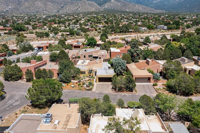 1865 Tramway Terrace Loop NE, Albuquerque, NM 87122 - aerial perspective of suburban area with a mountainous background