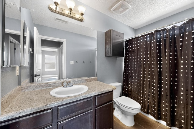 1324 Desert Paintbrush Loop, Rio Rancho, NM 87144 - bathroom with vanity, a textured ceiling, a shower with shower curtain, and tile patterned flooring