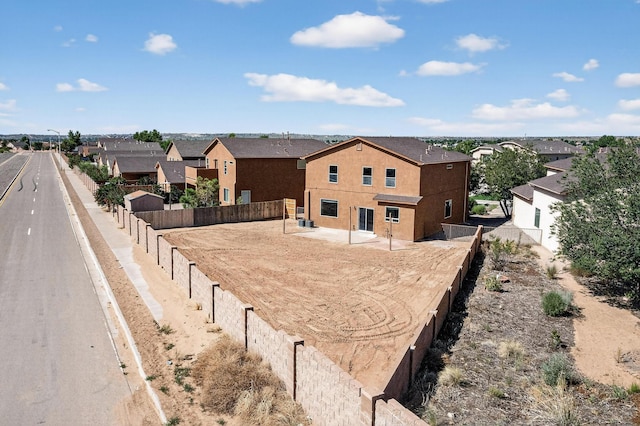 1324 Desert Paintbrush Loop, Rio Rancho, NM 87144 - fenced backyard featuring a residential view