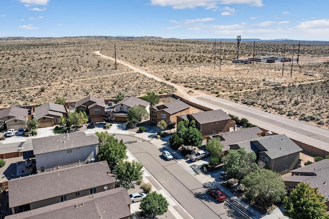 1324 Desert Paintbrush Loop, Rio Rancho, NM 87144 - aerial view of residential area featuring a desert landscape and a mountain backdrop