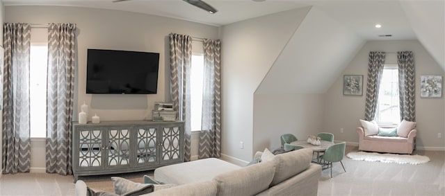 living room with carpet flooring and lofted ceiling