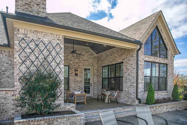 rear view of property featuring a patio area