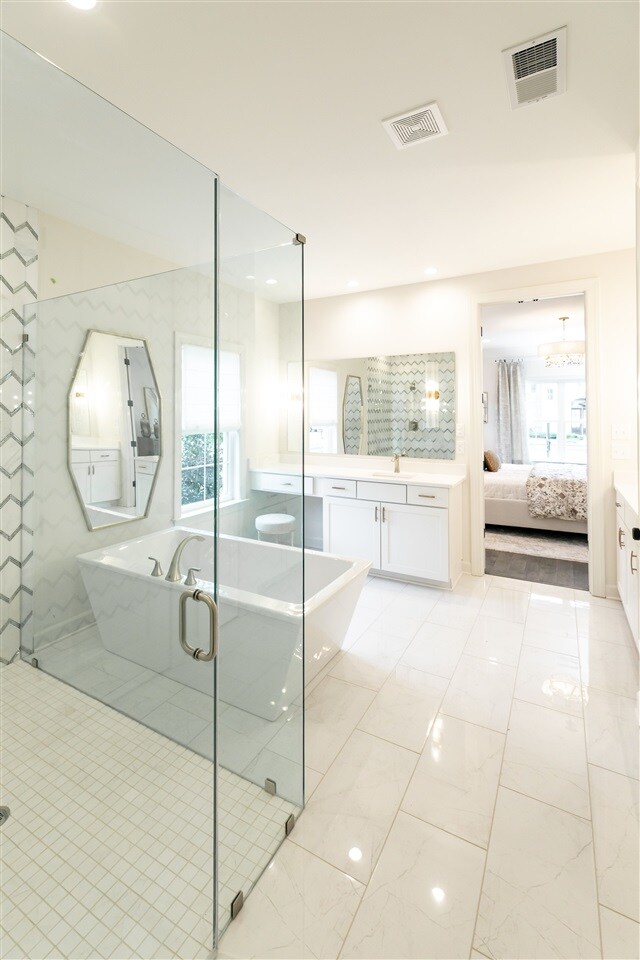9636 Grays Meadow Dr, Cordova, TN 38018 - ensuite bathroom with a shower stall, vanity, ensuite bath, and visible vents