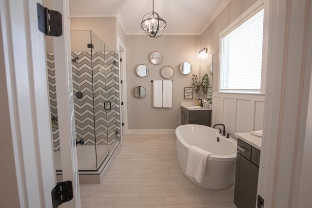 bathroom featuring vanity, independent shower and bath, a notable chandelier, tile flooring, and ornamental molding