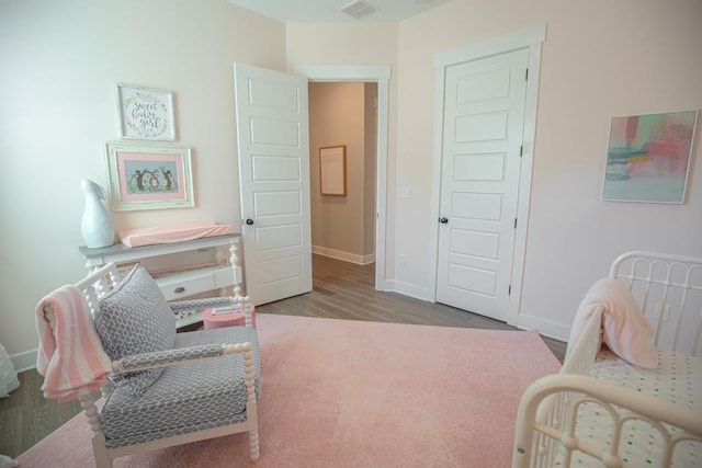 bedroom featuring light hardwood / wood-style floors