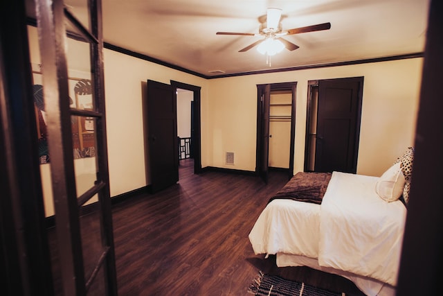 bedroom with ceiling fan, ornamental molding, and dark hardwood / wood-style floors