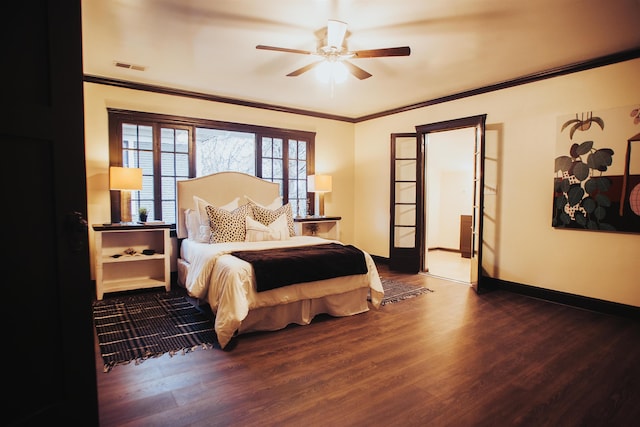 bedroom featuring ceiling fan, ornamental molding, and dark wood-type flooring